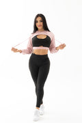 Conjunto negro y rosado de tres piezas con chompa, top y leggings