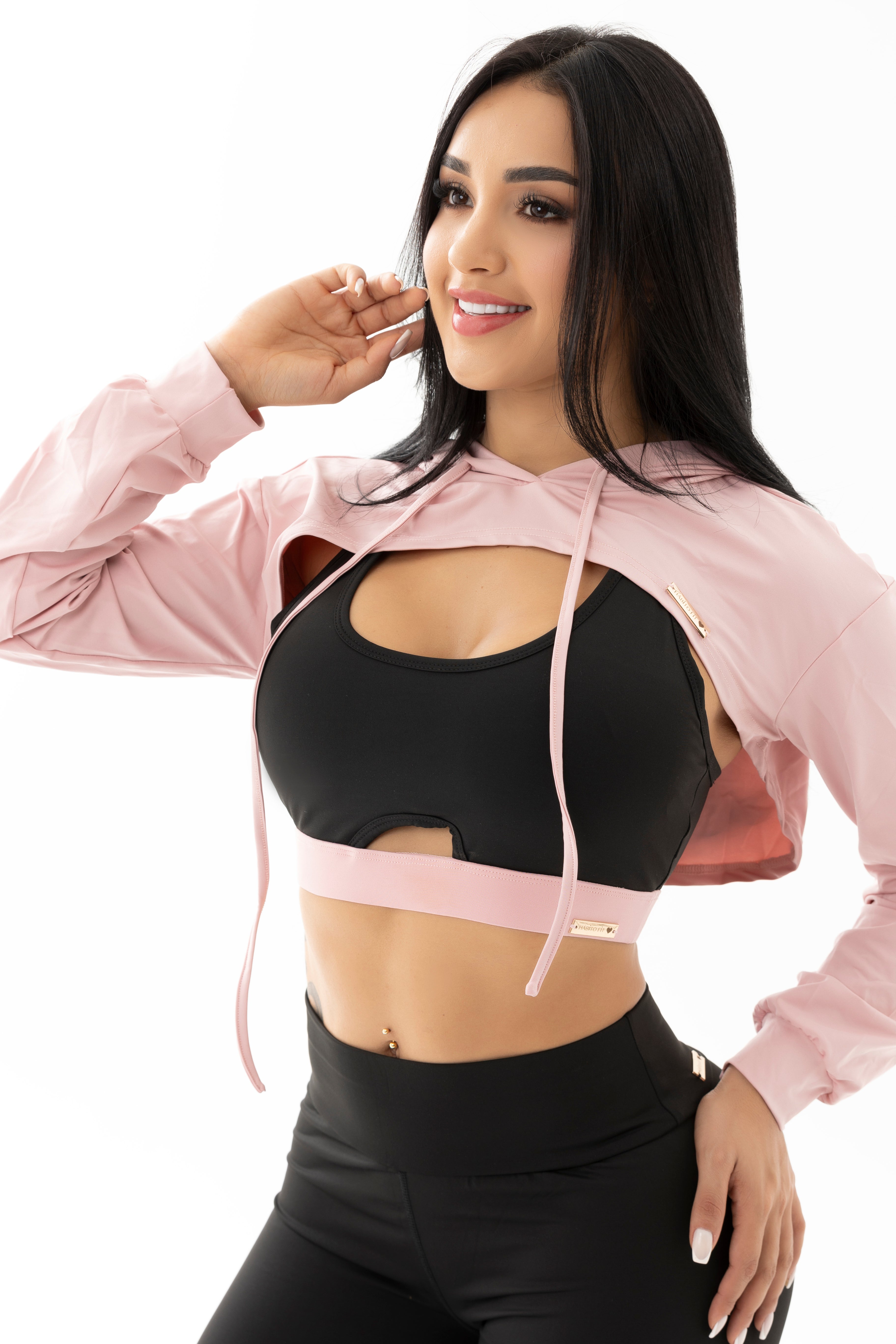 Conjunto negro y rosado de tres piezas con chompa, top y leggings