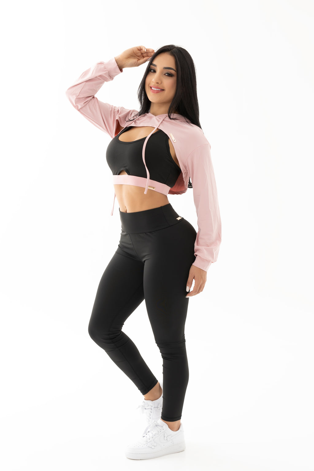 Conjunto negro y rosado de tres piezas con chompa, top y leggings