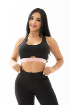 Conjunto negro y rosado de tres piezas con chompa, top y leggings