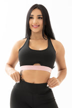 Conjunto negro y rosado de tres piezas con chompa, top y leggings